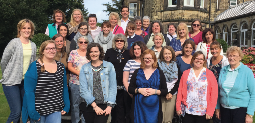 Volunteers and staff meet for annual training weekend