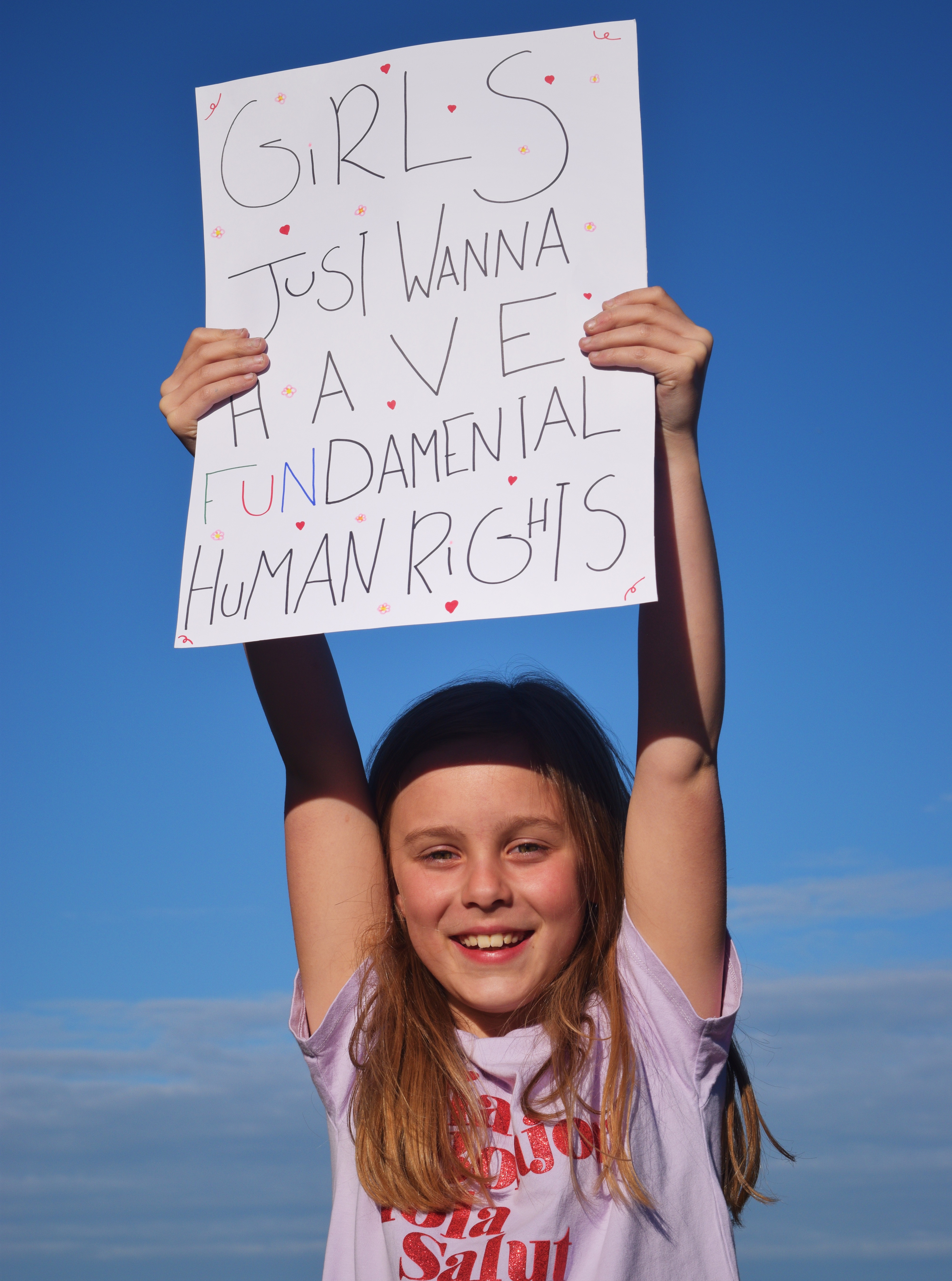 girl with rights sign